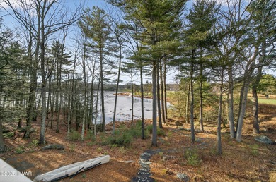 Welcome to this immaculate 4-bedroom LAKEFRONT home in the on Lords Valley Country Club, Inc in Pennsylvania - for sale on GolfHomes.com, golf home, golf lot