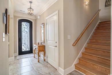 Welcome to this exquisite waterfront residence along the Intra on Arrowhead Country Club in South Carolina - for sale on GolfHomes.com, golf home, golf lot