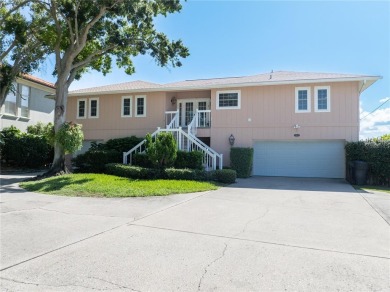 THE INTANGIBLE VALUE OF THIS 3 BEDROOM 2 FULL BATH, 2 HALF BATH on Mangrove Bay Golf Course in Florida - for sale on GolfHomes.com, golf home, golf lot