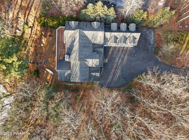 Welcome to this immaculate 4-bedroom LAKEFRONT home in the on Lords Valley Country Club, Inc in Pennsylvania - for sale on GolfHomes.com, golf home, golf lot