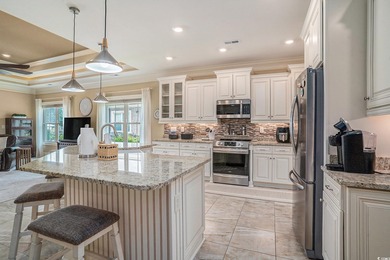 Welcome to this exquisite waterfront residence along the Intra on Arrowhead Country Club in South Carolina - for sale on GolfHomes.com, golf home, golf lot