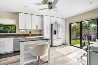 Discover this rare corner villa in the highly sought-after Deer on Deer Creek Golf Club in Florida - for sale on GolfHomes.com, golf home, golf lot