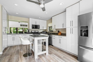 Discover this rare corner villa in the highly sought-after Deer on Deer Creek Golf Club in Florida - for sale on GolfHomes.com, golf home, golf lot
