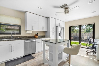 Discover this rare corner villa in the highly sought-after Deer on Deer Creek Golf Club in Florida - for sale on GolfHomes.com, golf home, golf lot