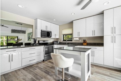 Discover this rare corner villa in the highly sought-after Deer on Deer Creek Golf Club in Florida - for sale on GolfHomes.com, golf home, golf lot