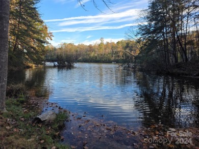 Here's your chance to own a lakefront lot along Shumont Lake on Rumbling Bald Resort on Lake Lure in North Carolina - for sale on GolfHomes.com, golf home, golf lot