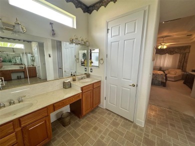 Great 3/2 Hampton Model on the Pond in Tamarron with a view to on Eagle Ridge At Spruce Creek Country Club in Florida - for sale on GolfHomes.com, golf home, golf lot