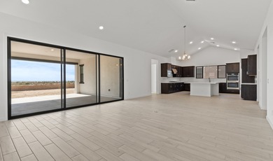 Expansive great room and dining area with optional vaulted on  in Arizona - for sale on GolfHomes.com, golf home, golf lot