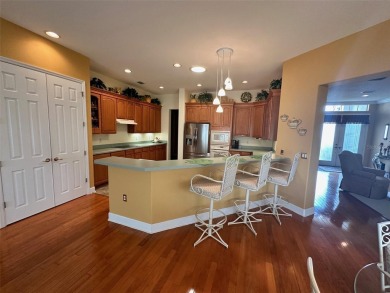 Great 3/2 Hampton Model on the Pond in Tamarron with a view to on Eagle Ridge At Spruce Creek Country Club in Florida - for sale on GolfHomes.com, golf home, golf lot