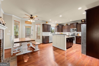 Welcome home to this stunning 5-bedroom, 3.5-bathroom gem on Traditions of Braselton Golf Club in Georgia - for sale on GolfHomes.com, golf home, golf lot