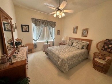 Great 3/2 Hampton Model on the Pond in Tamarron with a view to on Eagle Ridge At Spruce Creek Country Club in Florida - for sale on GolfHomes.com, golf home, golf lot