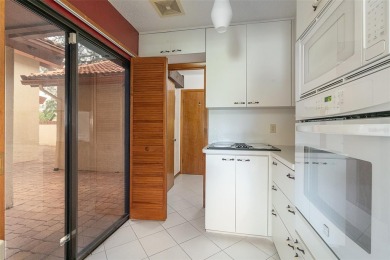 Golf Course Living at its Finest: Coveted Corner Unit in Pine on The Grand Club - Pine Lakes Course in Florida - for sale on GolfHomes.com, golf home, golf lot