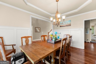 Welcome home to this stunning 5-bedroom, 3.5-bathroom gem on Traditions of Braselton Golf Club in Georgia - for sale on GolfHomes.com, golf home, golf lot