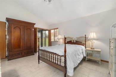 Golf Course Living at its Finest: Coveted Corner Unit in Pine on The Grand Club - Pine Lakes Course in Florida - for sale on GolfHomes.com, golf home, golf lot