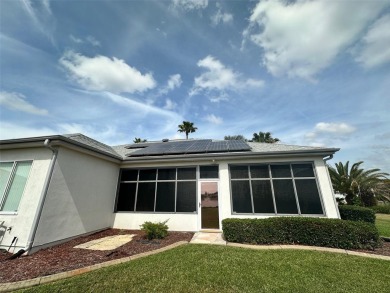 Great 3/2 Hampton Model on the Pond in Tamarron with a view to on Eagle Ridge At Spruce Creek Country Club in Florida - for sale on GolfHomes.com, golf home, golf lot