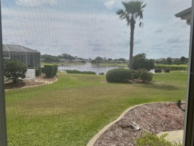 Great 3/2 Hampton Model on the Pond in Tamarron with a view to on Eagle Ridge At Spruce Creek Country Club in Florida - for sale on GolfHomes.com, golf home, golf lot