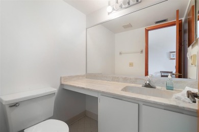 Golf Course Living at its Finest: Coveted Corner Unit in Pine on The Grand Club - Pine Lakes Course in Florida - for sale on GolfHomes.com, golf home, golf lot