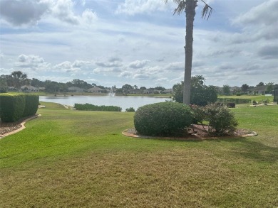 Great 3/2 Hampton Model on the Pond in Tamarron with a view to on Eagle Ridge At Spruce Creek Country Club in Florida - for sale on GolfHomes.com, golf home, golf lot