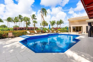 Welcome to this high-end, meticulously maintained 4-bedroom plus on Bocaire Country Club in Florida - for sale on GolfHomes.com, golf home, golf lot