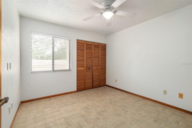 Golf Course Living at its Finest: Coveted Corner Unit in Pine on The Grand Club - Pine Lakes Course in Florida - for sale on GolfHomes.com, golf home, golf lot