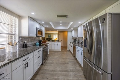 Impeccably renovated and move-in ready, this elegant villa is on Whiskey Creek Country Club in Florida - for sale on GolfHomes.com, golf home, golf lot