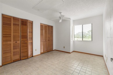 Golf Course Living at its Finest: Coveted Corner Unit in Pine on The Grand Club - Pine Lakes Course in Florida - for sale on GolfHomes.com, golf home, golf lot