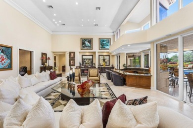 Welcome to this high-end, meticulously maintained 4-bedroom plus on Bocaire Country Club in Florida - for sale on GolfHomes.com, golf home, golf lot