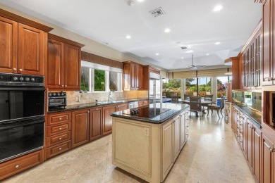 Welcome to this high-end, meticulously maintained 4-bedroom plus on Bocaire Country Club in Florida - for sale on GolfHomes.com, golf home, golf lot