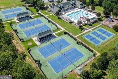Welcome home to this stunning 5-bedroom, 3.5-bathroom gem on Traditions of Braselton Golf Club in Georgia - for sale on GolfHomes.com, golf home, golf lot