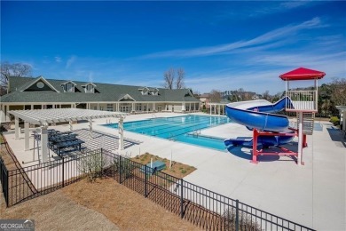 Welcome home to this stunning 5-bedroom, 3.5-bathroom gem on Traditions of Braselton Golf Club in Georgia - for sale on GolfHomes.com, golf home, golf lot