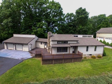 Exclusive Ridgetop Retreat Overlooking Wytheville Golf Club! on Wytheville Golf Club, Inc. in Virginia - for sale on GolfHomes.com, golf home, golf lot