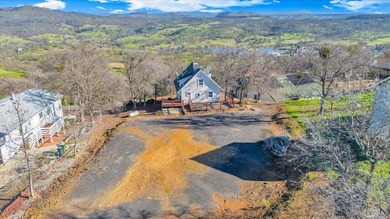 Enjoy 180-degree views of Copperopolis and Lake Tulloch from on The Club at Copper Valley Golf Course in California - for sale on GolfHomes.com, golf home, golf lot