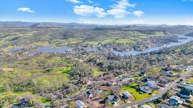 Enjoy 180-degree views of Copperopolis and Lake Tulloch from on The Club at Copper Valley Golf Course in California - for sale on GolfHomes.com, golf home, golf lot