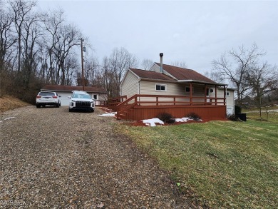 Well-maintained 3-bedroom, 1-bath home with eat-in kitchen and on Cadiz Country Club in Ohio - for sale on GolfHomes.com, golf home, golf lot