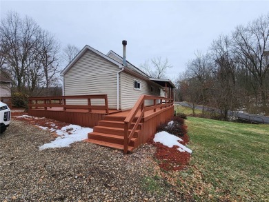 Well-maintained 3-bedroom, 1-bath home with eat-in kitchen and on Cadiz Country Club in Ohio - for sale on GolfHomes.com, golf home, golf lot