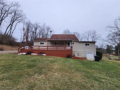 Well-maintained 3-bedroom, 1-bath home with eat-in kitchen and on Cadiz Country Club in Ohio - for sale on GolfHomes.com, golf home, golf lot