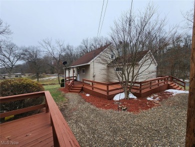 Well-maintained 3-bedroom, 1-bath home with eat-in kitchen and on Cadiz Country Club in Ohio - for sale on GolfHomes.com, golf home, golf lot