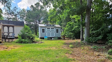 Charming 3-bedroom, 2-bath home in the heart of Denver, just 1 on Westport Golf Club in North Carolina - for sale on GolfHomes.com, golf home, golf lot