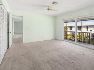 WOW! HERE IS AN AWESOME COZY 2ND FLOOR CONDOMINIUM LOCATED IN on The Glades Golf and Country Club in Florida - for sale on GolfHomes.com, golf home, golf lot