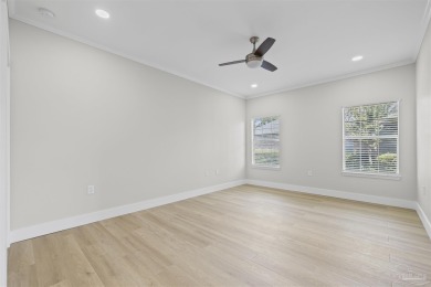 Beautifully updated home on the 13th tee of Tiger Point Golf on Tiger Point Golf and Country Club in Florida - for sale on GolfHomes.com, golf home, golf lot