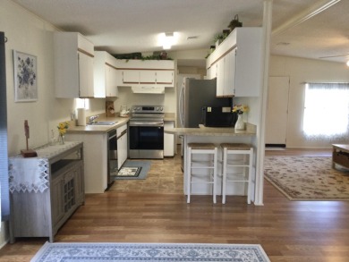 2025 roof on this nicely updated home  and it's just what you on Spanish Lakes I in Florida - for sale on GolfHomes.com, golf home, golf lot