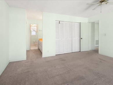 WOW! HERE IS AN AWESOME COZY 2ND FLOOR CONDOMINIUM LOCATED IN on The Glades Golf and Country Club in Florida - for sale on GolfHomes.com, golf home, golf lot