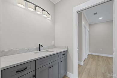 Beautifully updated home on the 13th tee of Tiger Point Golf on Tiger Point Golf and Country Club in Florida - for sale on GolfHomes.com, golf home, golf lot