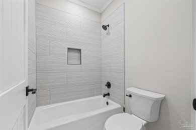 Beautifully updated home on the 13th tee of Tiger Point Golf on Tiger Point Golf and Country Club in Florida - for sale on GolfHomes.com, golf home, golf lot