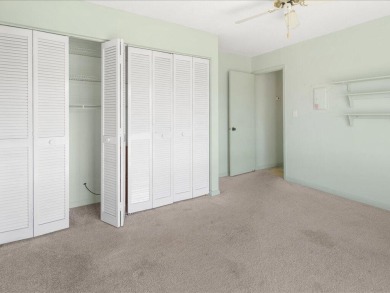 WOW! HERE IS AN AWESOME COZY 2ND FLOOR CONDOMINIUM LOCATED IN on The Glades Golf and Country Club in Florida - for sale on GolfHomes.com, golf home, golf lot