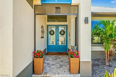 Built in 2023 along the 120-foot Optimist Canal, this on Burnt Store Golf Club in Florida - for sale on GolfHomes.com, golf home, golf lot