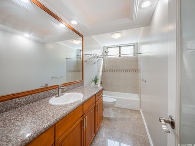 This single-family home near the entrance of desirable Kalama on Hawaii Kai Golf Course  in Hawaii - for sale on GolfHomes.com, golf home, golf lot