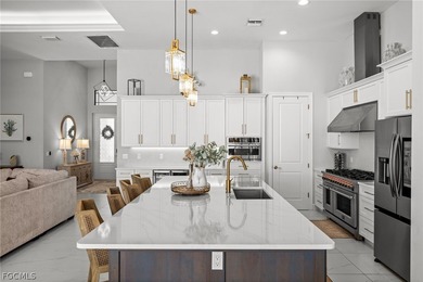 Built in 2023 along the 120-foot Optimist Canal, this on Burnt Store Golf Club in Florida - for sale on GolfHomes.com, golf home, golf lot