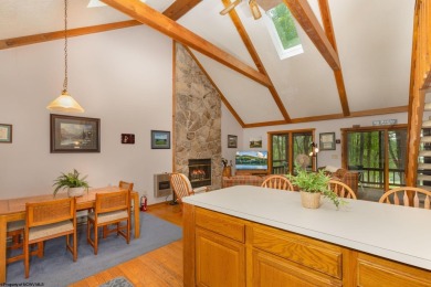 Welcome to 'Putter's Paradise', a delightful cabin nestled in on Alpine Lake Resort in West Virginia - for sale on GolfHomes.com, golf home, golf lot