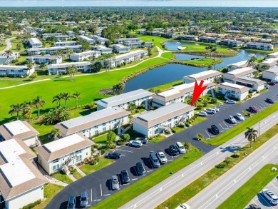 WOW! HERE IS AN AWESOME COZY 2ND FLOOR CONDOMINIUM LOCATED IN on The Glades Golf and Country Club in Florida - for sale on GolfHomes.com, golf home, golf lot